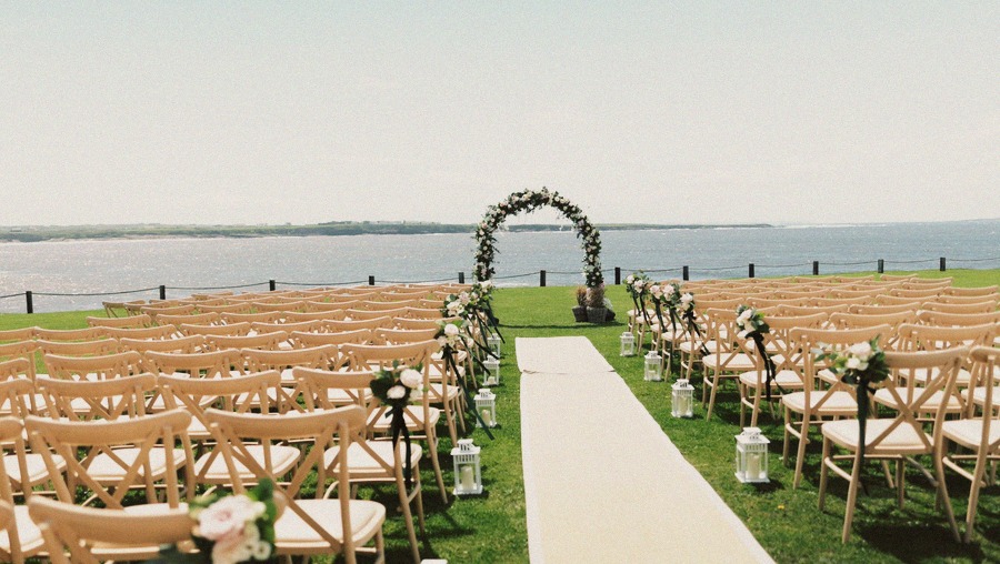 Outdoor coastal wedding ceremony setup in Ireland